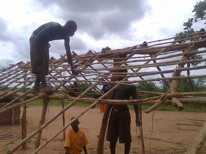 In 2011, I chansed on these students of Nandikrom DA Primary School in the Krachi Nchumuru District of the Volta Region. The previous nights rain peeled off their roof so they had to repair it before classes. There are many such schools in the country.