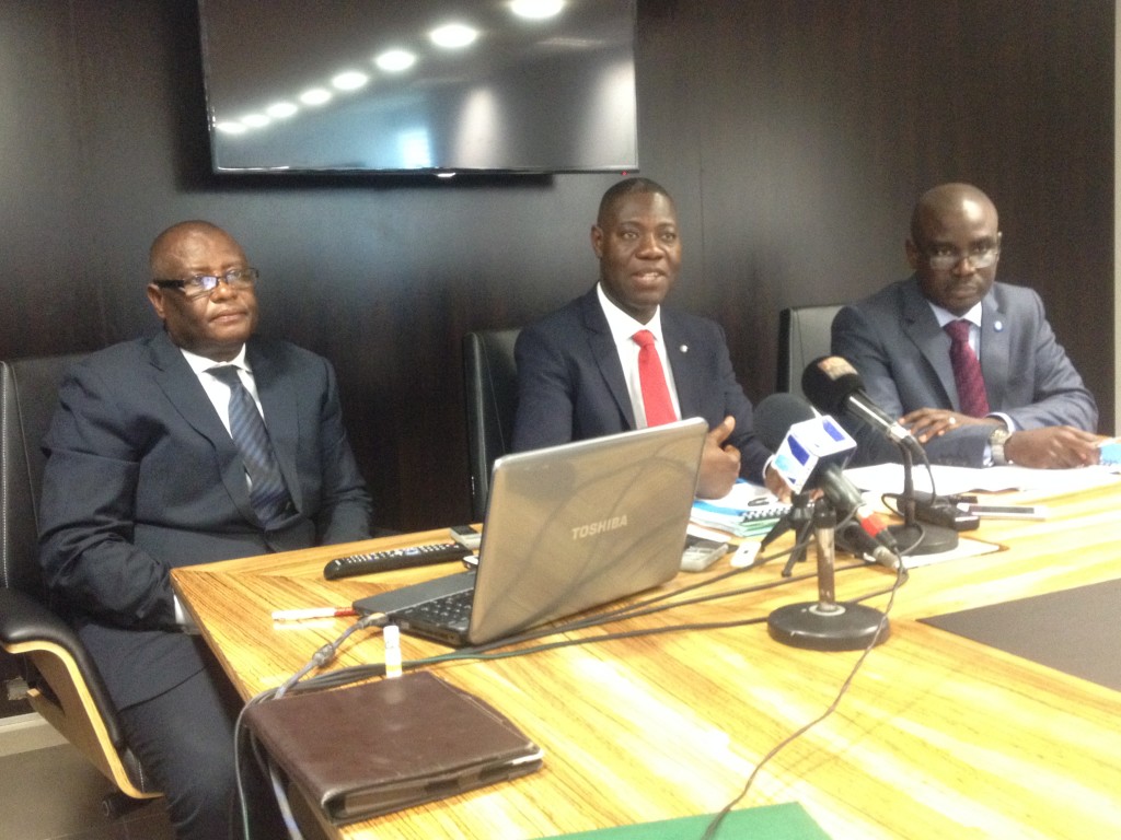 MD of ADB (middle) Stephen Kpodzi, addressing the media on the IPO 