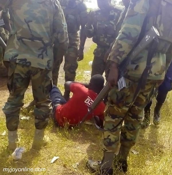 The Nanton ballot box snatcher in hands of soldiers