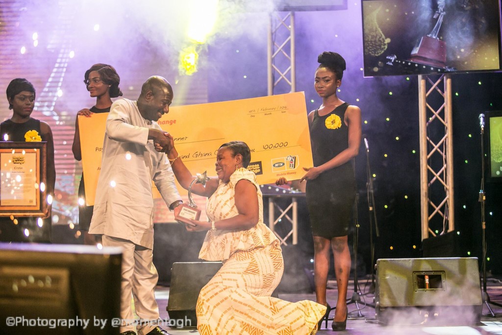 Madam Paulina Opei knelt in appreciation as CEO of MTN Ghana presented her with a trophy and a cheque of GHc100,000 for being the ultimate winner of MTN Heroes of Change Season II