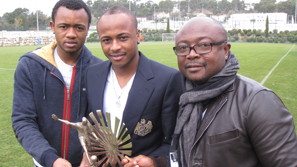 The Ayew Brothers with their father